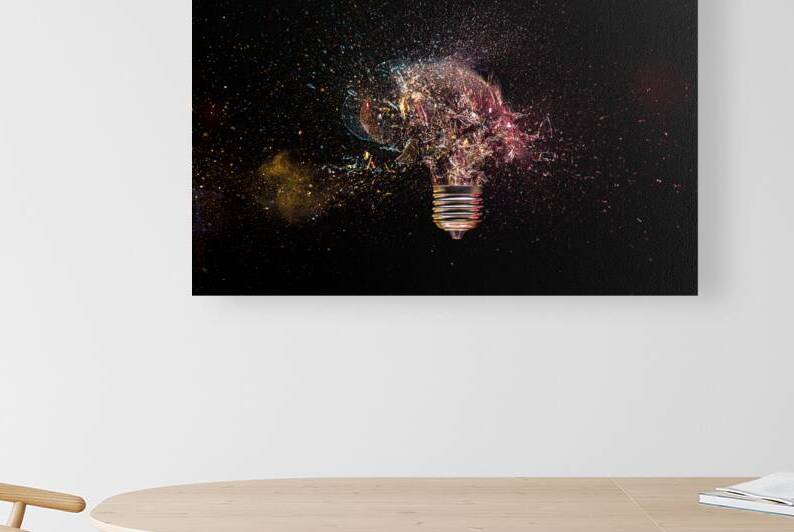Shattered light bulb moment on dark background by Gualtiero Boffi