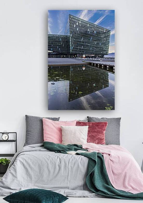 Harpa concert hall and conference centre reflecting in water on  by Gualtiero Boffi