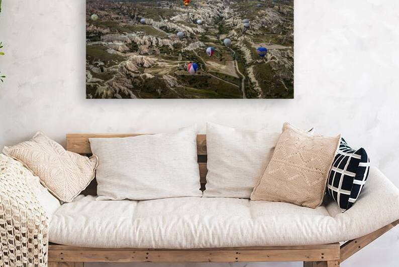 Hot air balloons flying over cappadocia region in turkey by Gualtiero Boffi