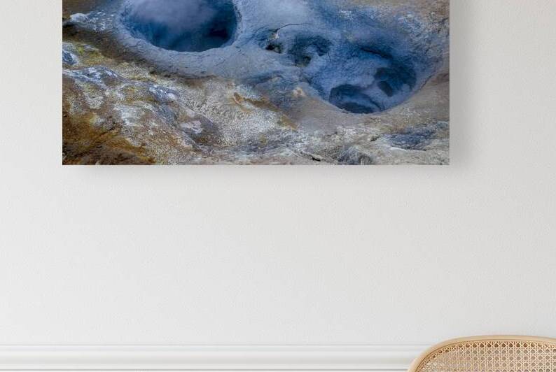Geothermal area releasing steam from colorful hot springs by Gualtiero Boffi