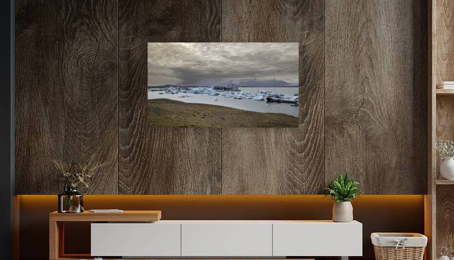 Icebergs floating on jokulsarlon glacier lagoon with storm appro by Gualtiero Boffi