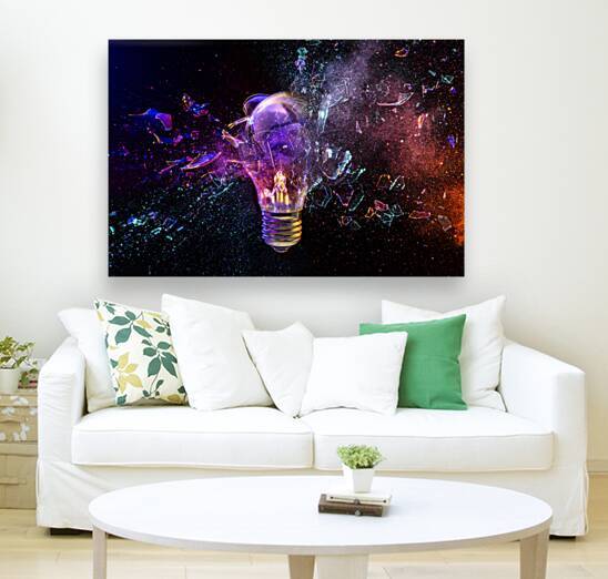Light bulb exploding with colorful powder effect by Gualtiero Boffi
