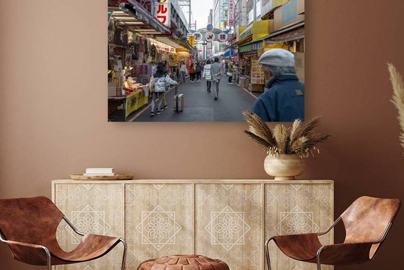 Tourists walking down busy shopping street in tokyo japan by Gualtiero Boffi