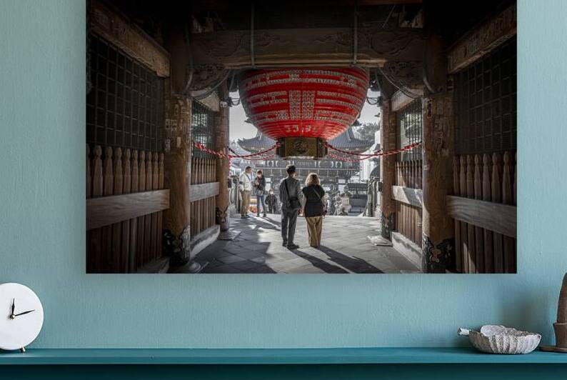 Tourists admiring giant red lantern in japanese temple by Gualtiero Boffi
