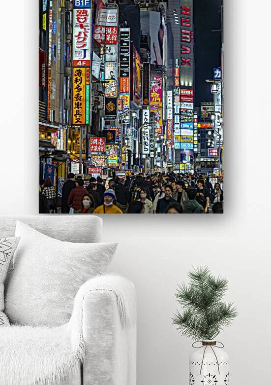 Tourists walking in crowd at night in shinjuku tokyo by Gualtiero Boffi