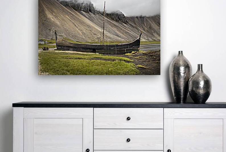 Old wooden viking boat stranded by Gualtiero Boffi