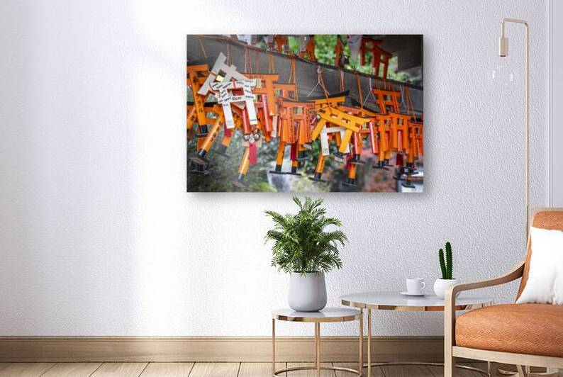 Many bright orange wooden torii gates  by Gualtiero Boffi