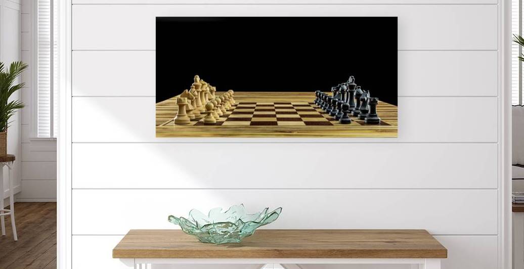 Wooden chess pieces standing on chessboard by Gualtiero Boffi
