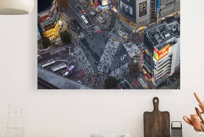 Aerial view of pedestrians crossing shibuya scramble crossing at by Gualtiero Boffi