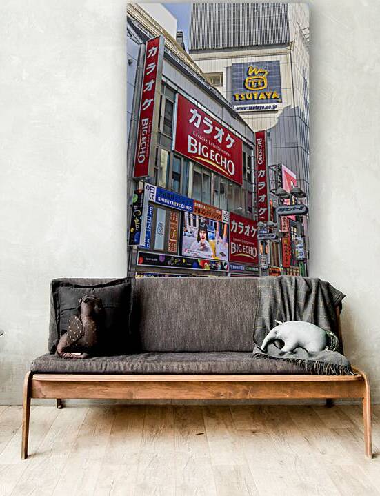 Bright red big echo karaoke and tsutaya signs stand out against  by Gualtiero Boffi