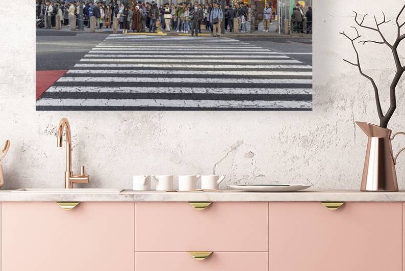 Tourists and citizens waiting to cross the street at a crosswalk by Gualtiero Boffi