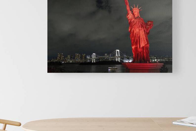 statue of liberty illuminating tokyo bay at night with rainbow b by Gualtiero Boffi