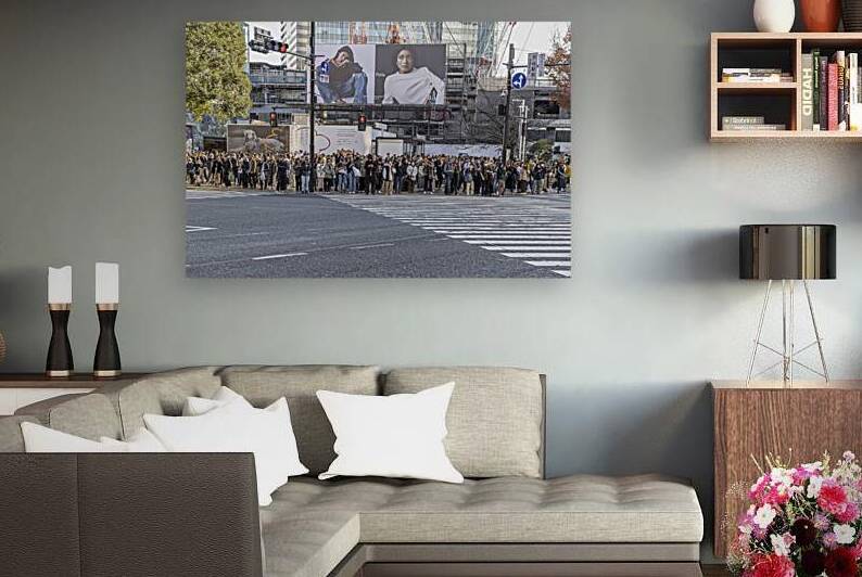 Tourists and citizens waiting to cross a street at a famous inte by Gualtiero Boffi