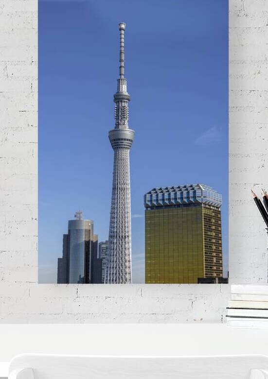 Tokyo skytree rising high above the cityscape on a sunny day by Gualtiero Boffi