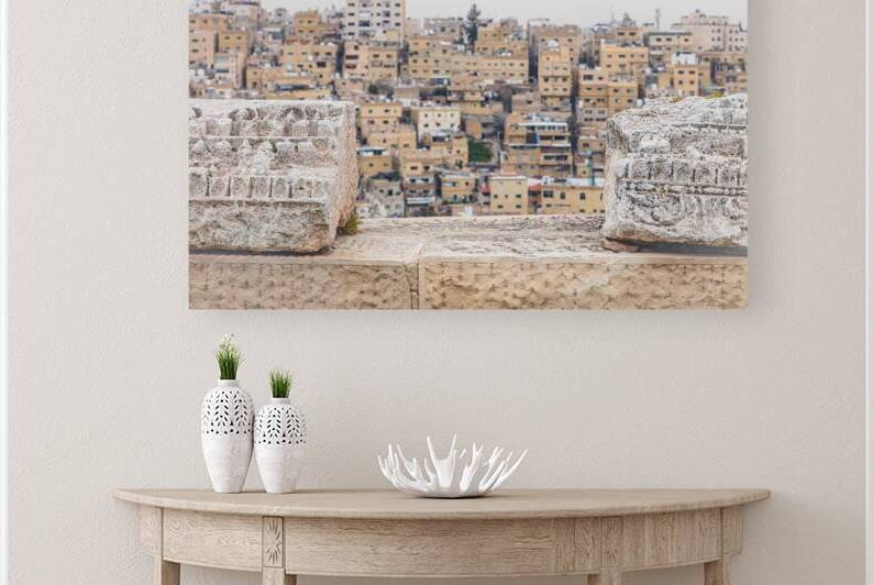 Amman city skyline rising above ancient roman ruins of the amman by Gualtiero Boffi