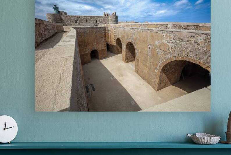 Castello maniace archways and defensive walls bathed in sunlight by Gualtiero Boffi