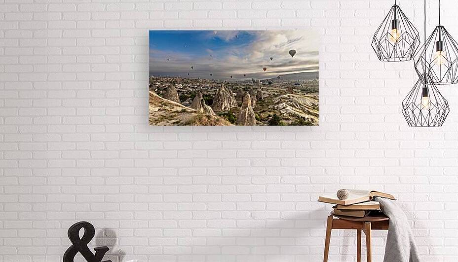 Hot air balloons flying over the fairy chimneys and rock formati by Gualtiero Boffi