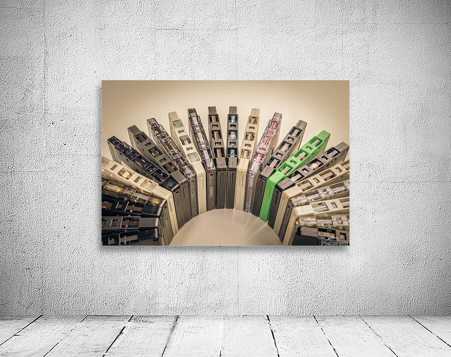 old cassettes arranged in an arc background Wall Preview