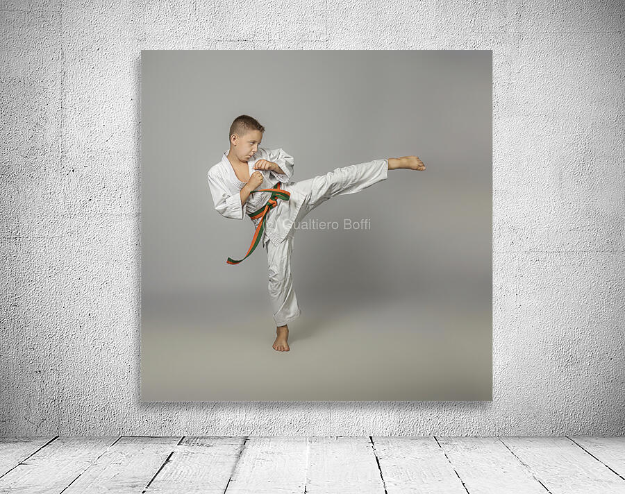 boy performs a side kick Wall Preview