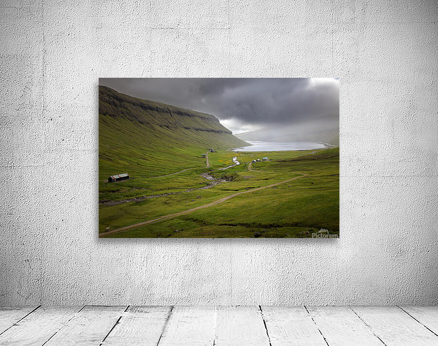 valley with cloudy sky on faroe islands Wall Preview