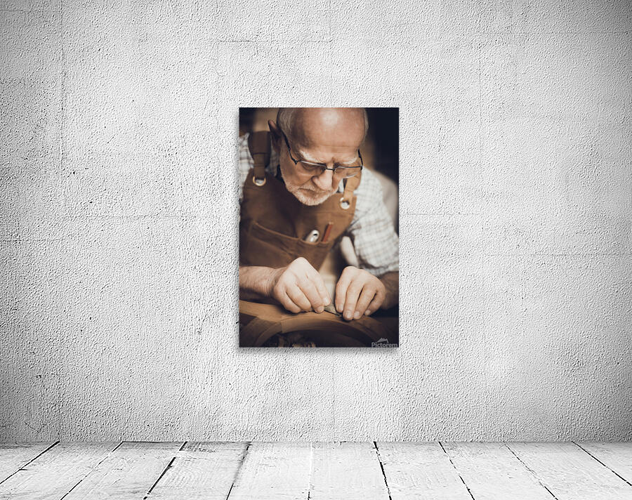 old carpenter at work Wall Preview