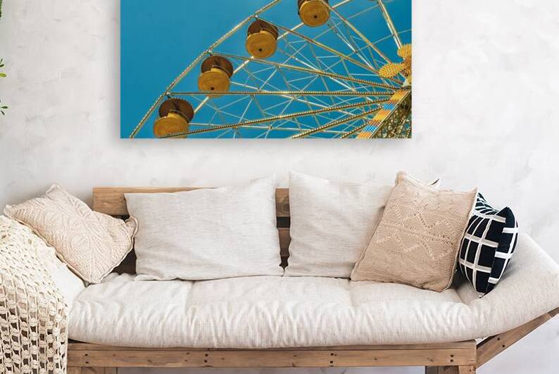 Ferris wheel in blue and yellow by Patricia Hofmeester PHotography