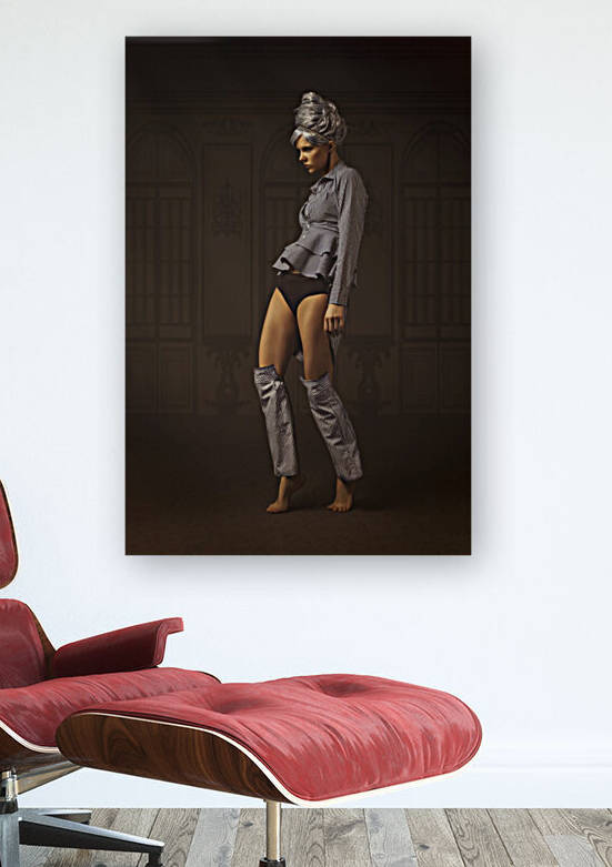 Young woman with grey hair hair wearing a striped shirt and shirt sleeves as leg warmers standing on her toes in an empty dark ballroom by Artmood Visualz