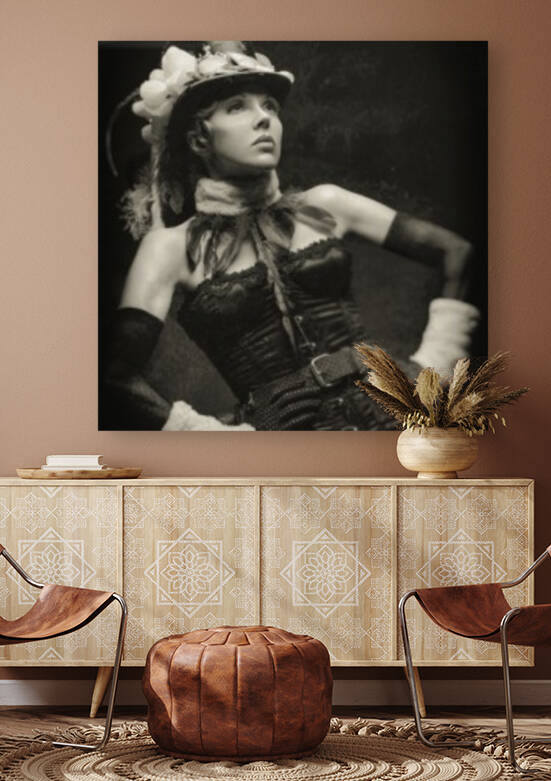 Old-fashioned black and white portrait of a young cabaret showgirl in her stage costume by Artmood Visualz