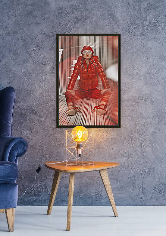 Beautiful blonde fashion model wearing braids in a red outfit with grill glasses sitting in a white striped plastic environment by Artmood Visualz