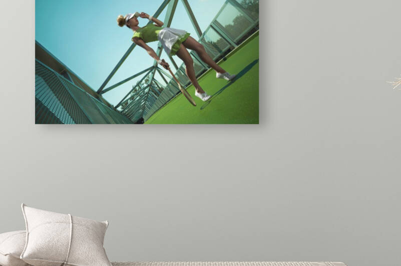 Young blonde woman with two hair buns wearing a green tennis outfit and holding a tennis racket on an urban court by Artmood Visualz