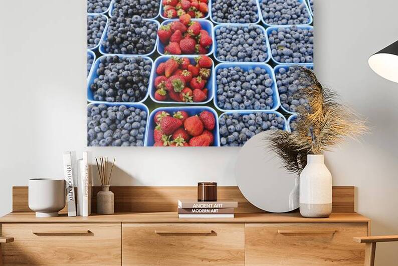 Containers of fresh ripe in season organic blueberries and strawberries at a farmers market in the Fraser Valley British Columbia Canada. by Kevin Miller Photography