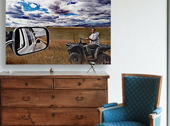 Canadian cowboy herder riding atv Alberta by Kevin Miller Photography