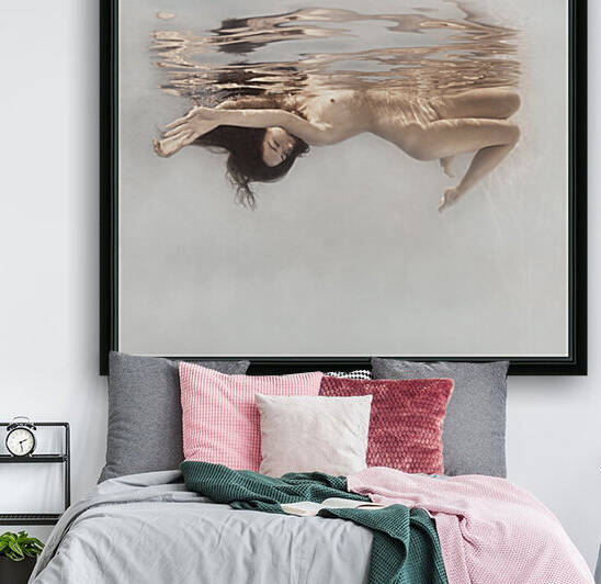 Woman underwater by Dmiry Laudin