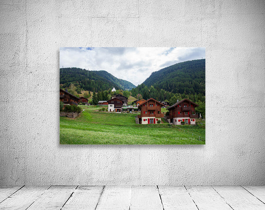 Charming houses dotting the Swiss Alps in Switzerland. Wall Preview