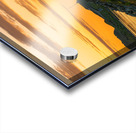 A car on the Fredvang bridges in Lofoten Norway with a beautiful sunset over the sea.  Acrylic print