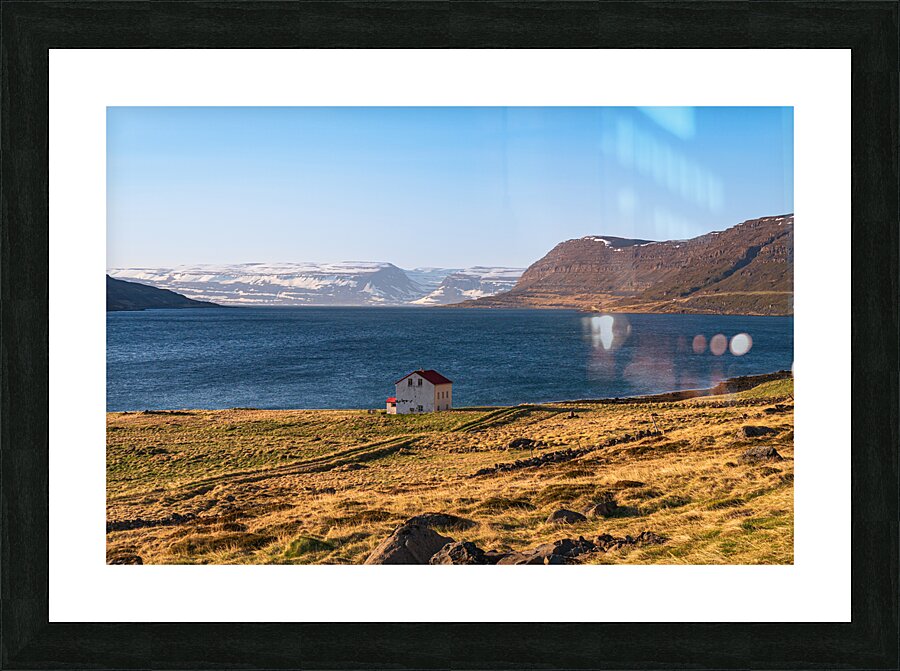 Lonely house in northern Iceland with wild nature Picture Frame print