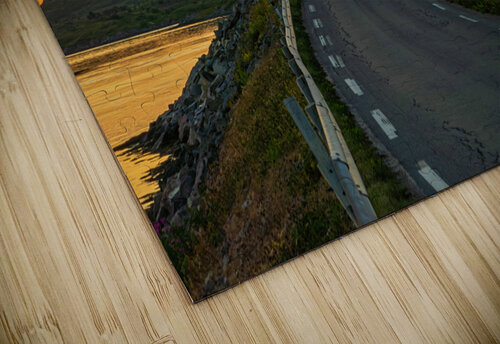 A car on the Fredvang bridges in Lofoten Norway with a beautiful sunset over the sea.  John Nilsson puzzle