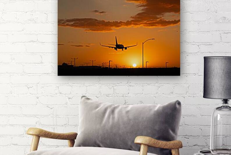 Silhouette of an aircraft landing at LAX  by John Nilsson