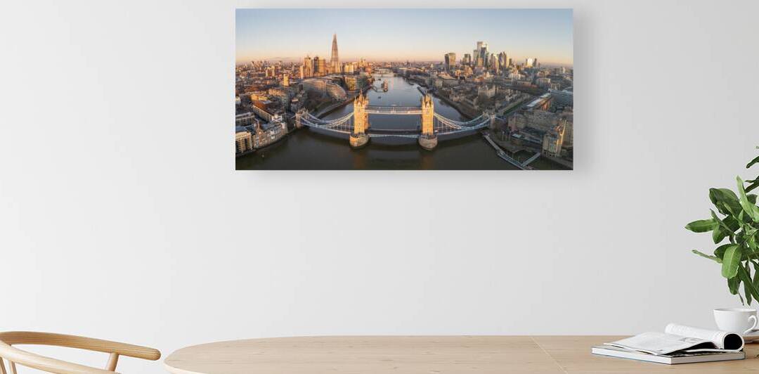 London Tower bridge with surrounding skyscrapers of the downtown at dawn by John Nilsson