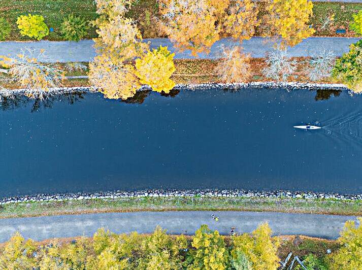 Vertical view of a person in a kayak by John Nilsson