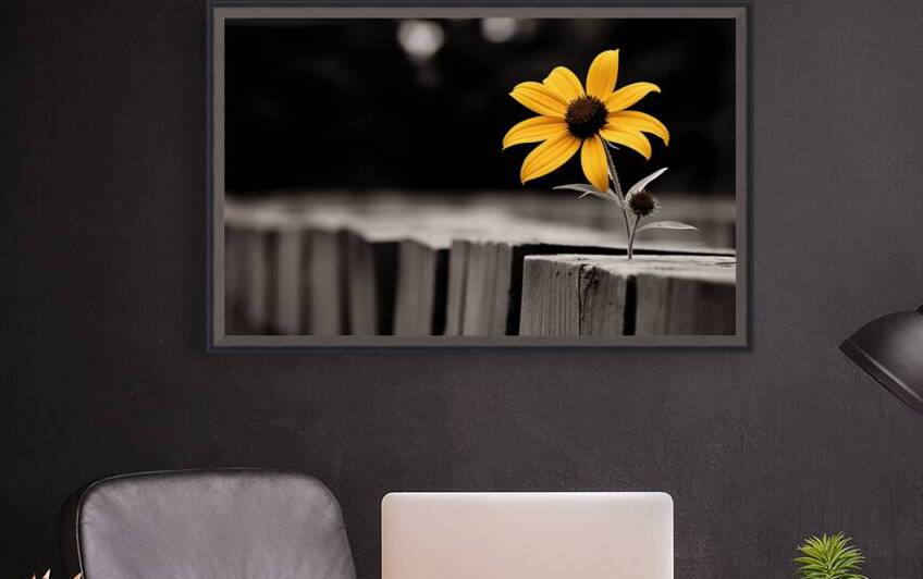 Defiant Bloom – Yellow Flower on Fence Print by Savage Art Prints