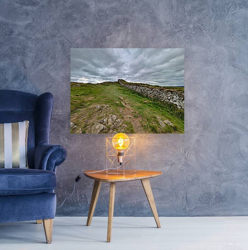 Hadrians wall under a dramatic sky Reproduction