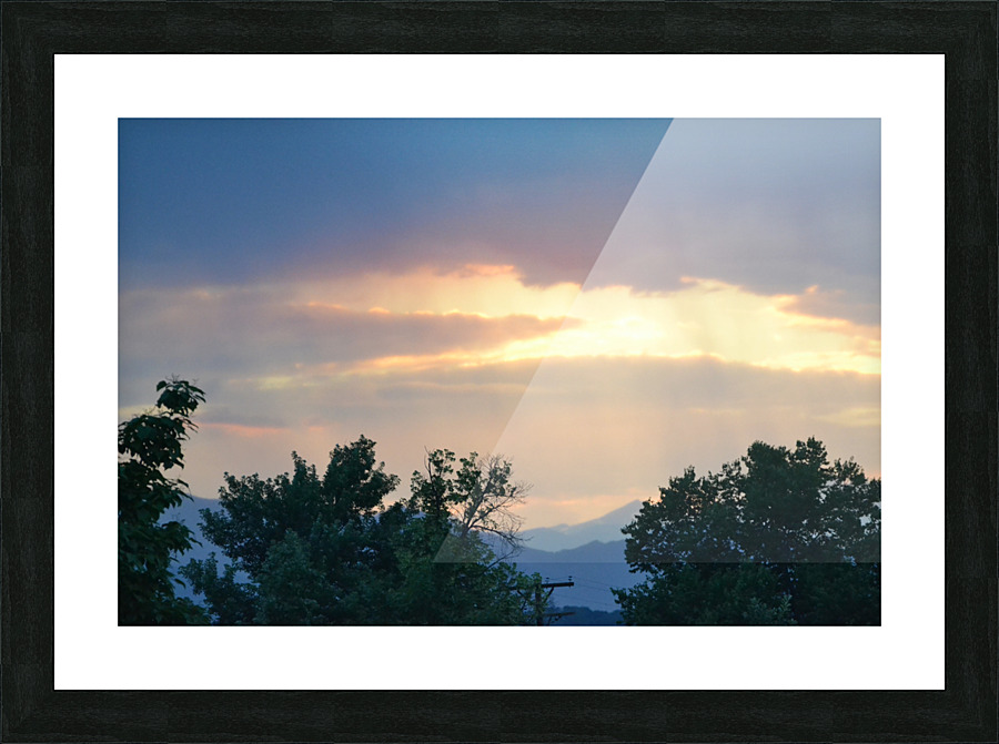 Sun breaking out of the trees to the heaven’s  Picture Frame print