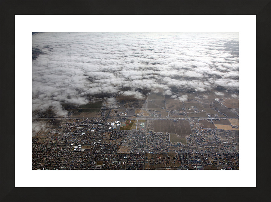 Clouds Obscuring a Town Picture Frame print