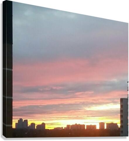 Sunset over the city Canvas Print