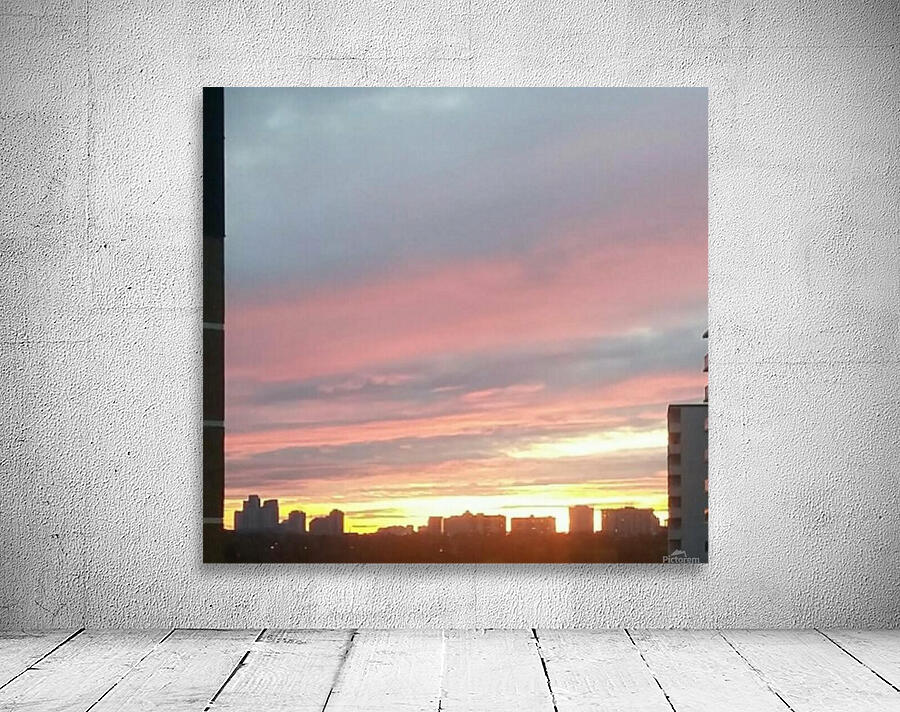 Sunset over the city Wall Preview