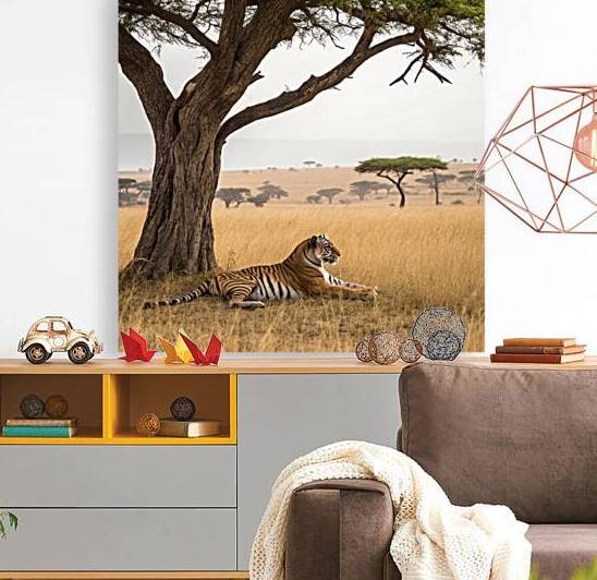 in the African savannah under a tree a tiger relaxes by rassam