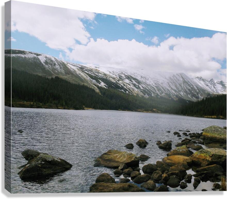 Clouds Over Snow Dusted Mountains Canvas Print