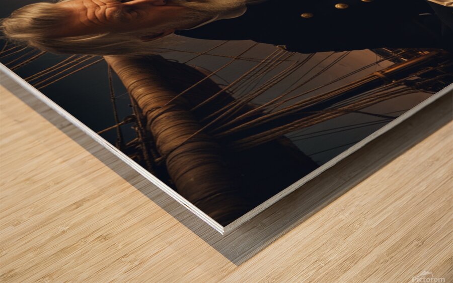 Old sailing ship captain looking at his old brass compass night time with ruff ocean behind him Wood print