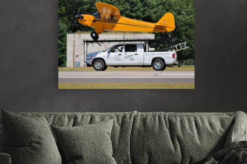  Piper J3C 65 Cub. taking off from truck by Ross Sharp